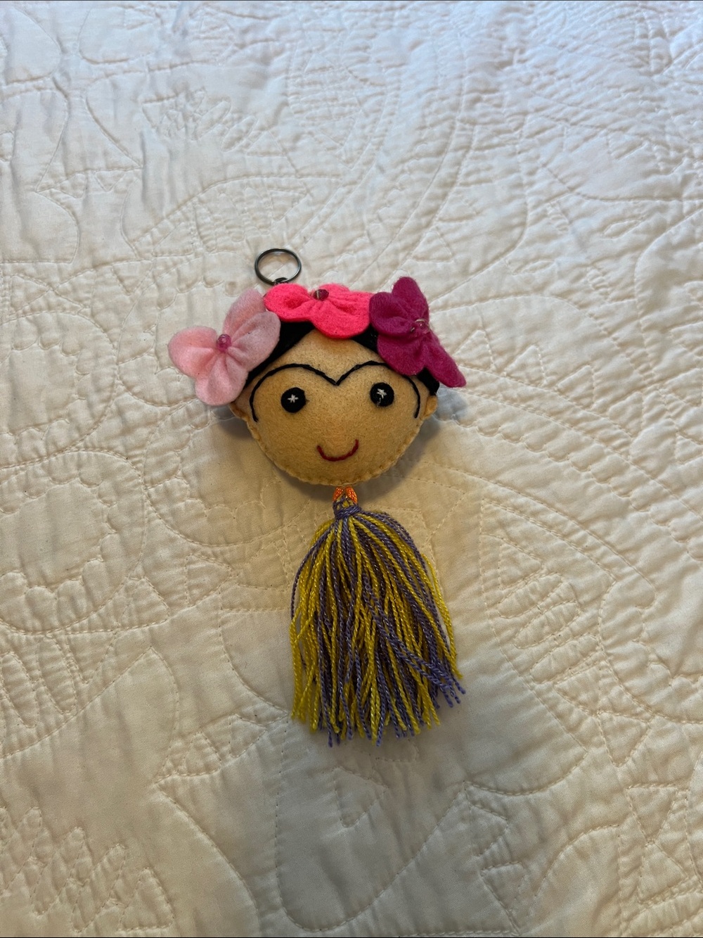Frida-Inspired Pink Flower Plush Keychain with Yellow & Purple Tassel